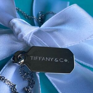 Tiffany & Co. Sterling Silver diamond Tag Pendant.